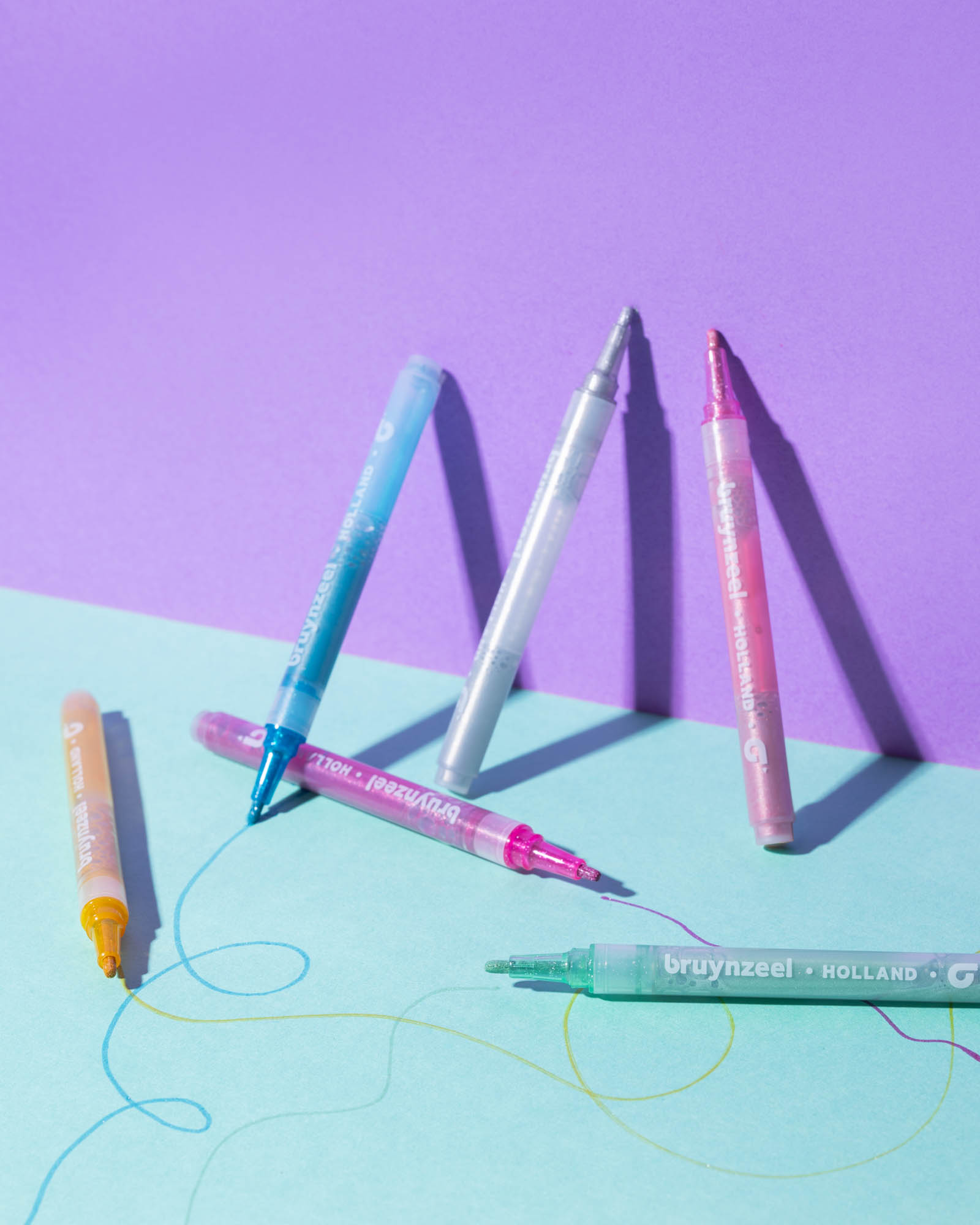 Bruynzeel glittermarkers op pastel paars en mint